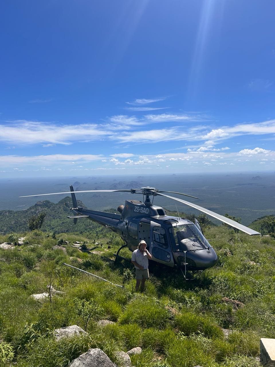 Helicopter landing on a remote mountainside